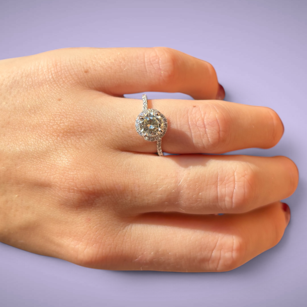 Anello con diamante taglio brillante ct1,19 certificato IGI e diamanti taglio brillante ct0,46