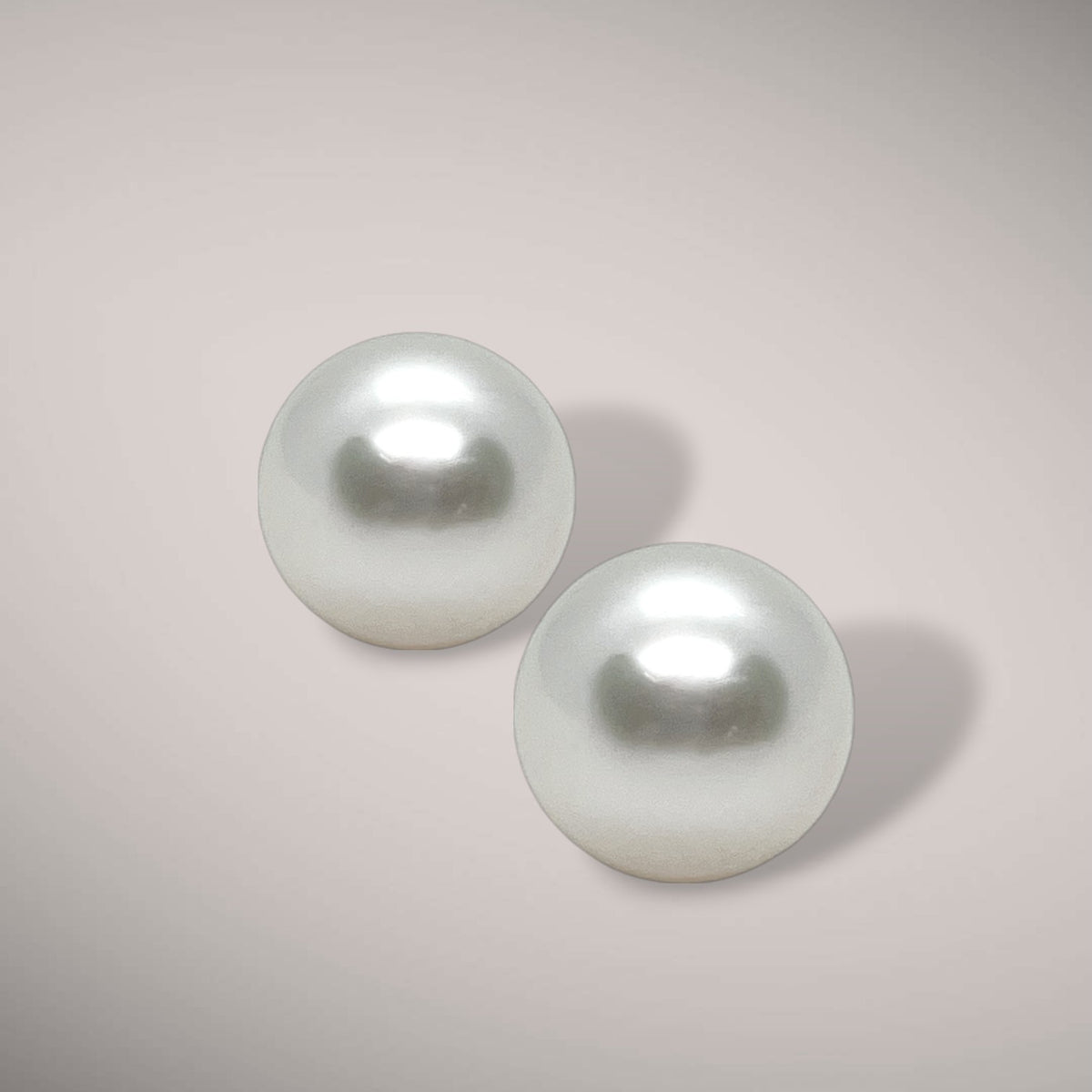 Orecchini in oro kt18 con perle australiane naturali coltivate 11-12mm