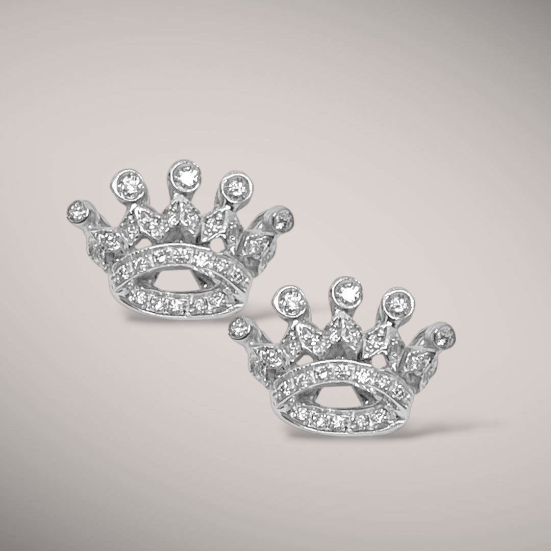 Orecchini in oro kt18 con diamanti taglio brillante ct0,50
