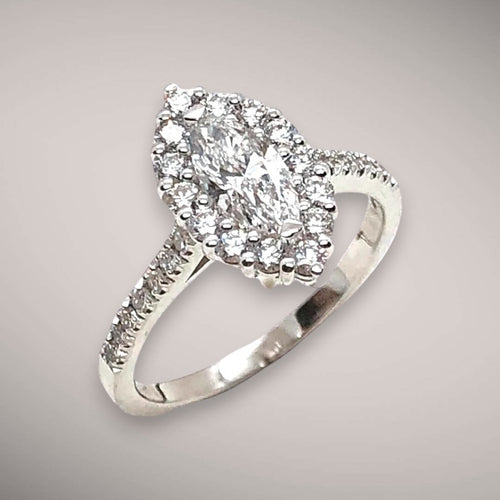 Anello in oro kt18 con diamante marquise ct0,70 F VS e diamanti taglio brillante ct0,74