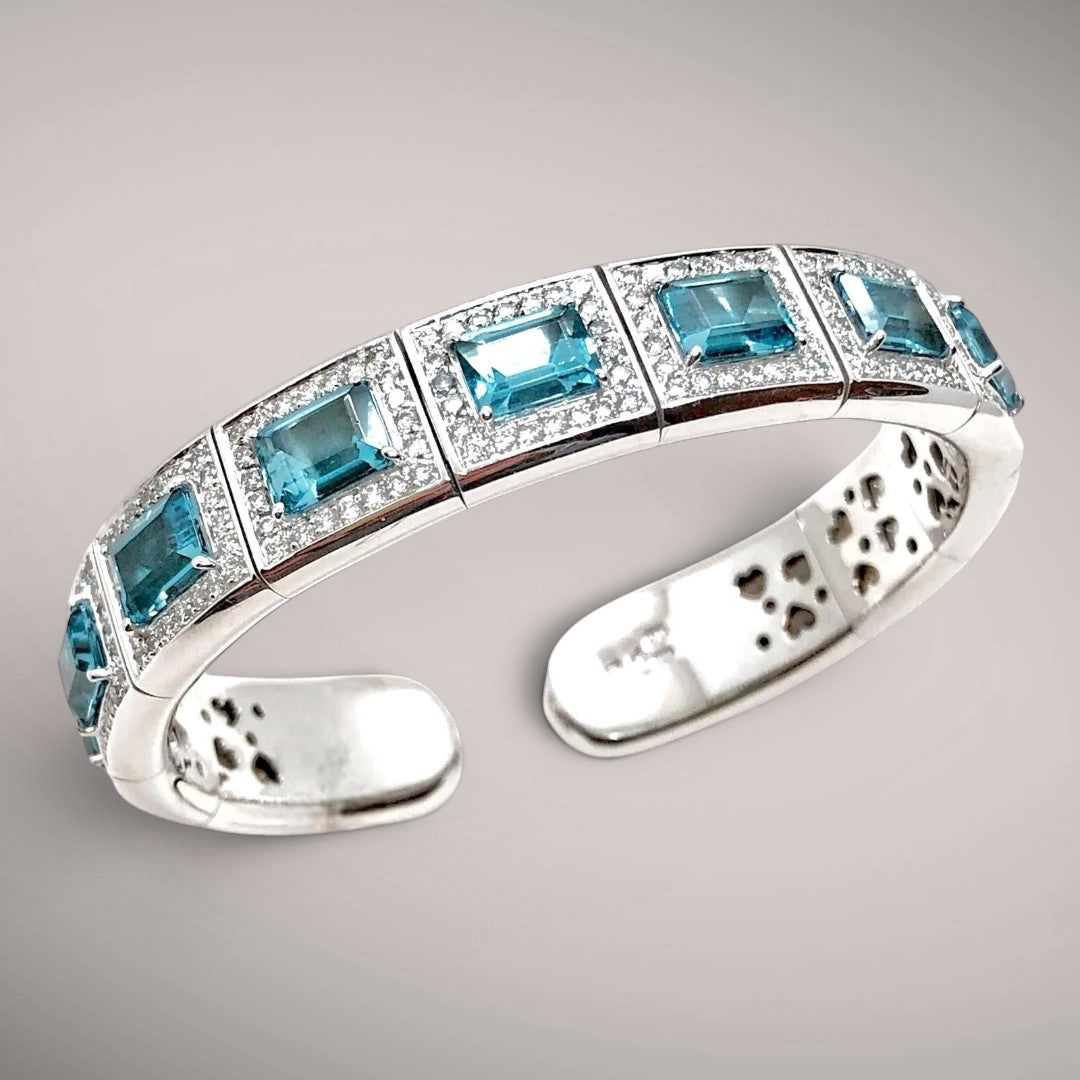 Bracciale in oro kt18 con diamanti e topazi