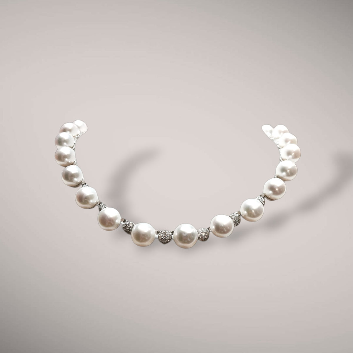 Collana in oro kt18 con diamanti taglio brillante ct1,25 e perle australiane naturali coltivate