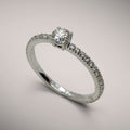 Anello in oro kt18 con diamante taglio brillante ct0,30 e diamanti taglio brillante ct0,56 G SI