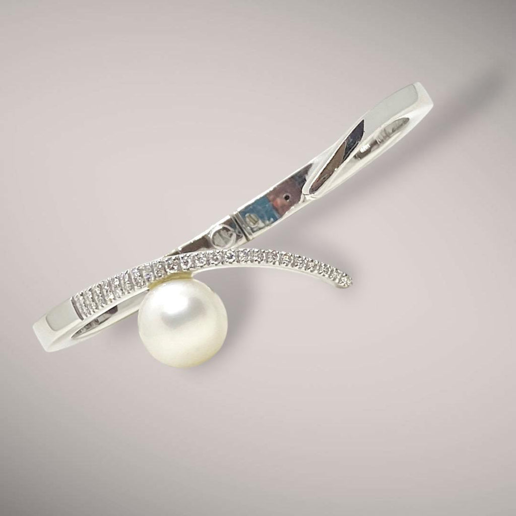 Bracciale  con diamanti taglio brillante ct0,29 F VS e perla australiana naturale coltivata