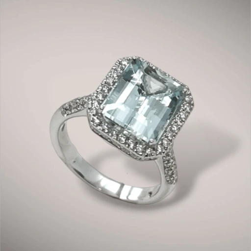 Anello in oro kt18 diamanti taglio brillante ct0,63 e acquamarina ct4,28